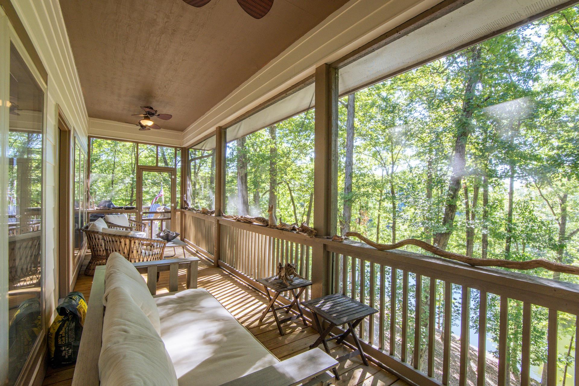 120 Pier Point Savannah, TN 38372 - Photo 15 of 38 Sunroom with a ceiling fan and view of wooded area