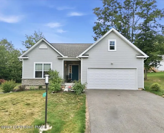 a front view of house with yard