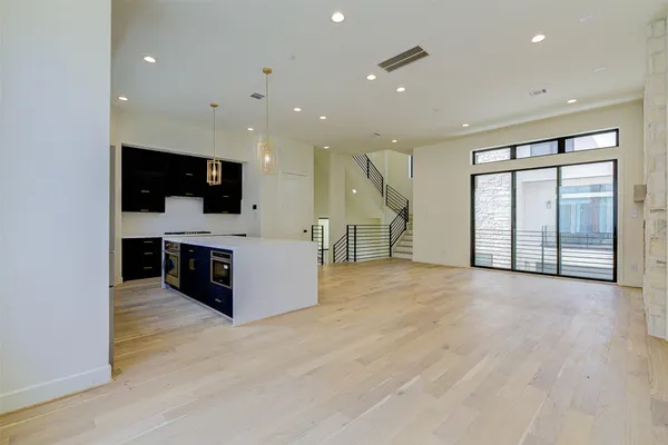 a big room with closet and windows