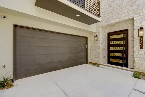 a bedroom with a bed and a cabinets