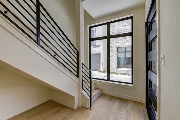 a view of a livingroom with wooden floor