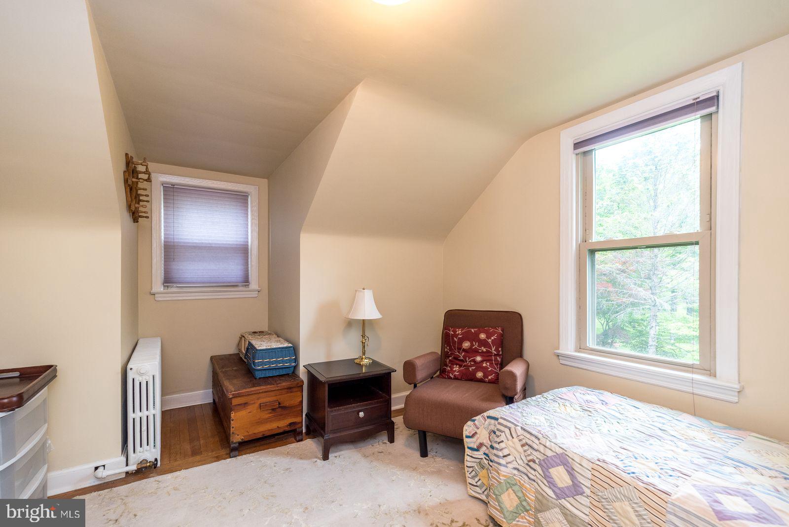534 Pinney Road Huntingdon Valley, PA 19006 - Photo 20 of 26 a bedroom with a bed and a couch