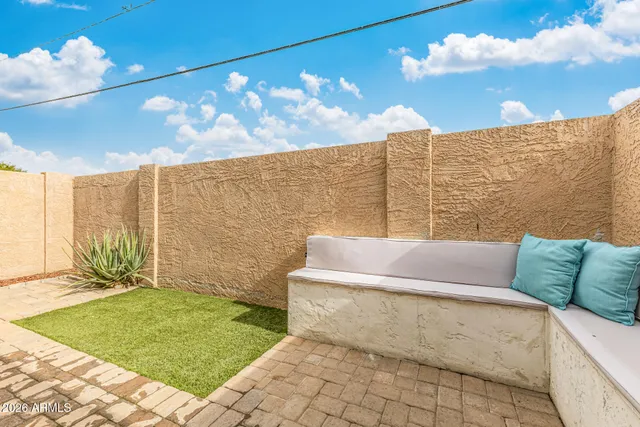 a view of outside with furniture