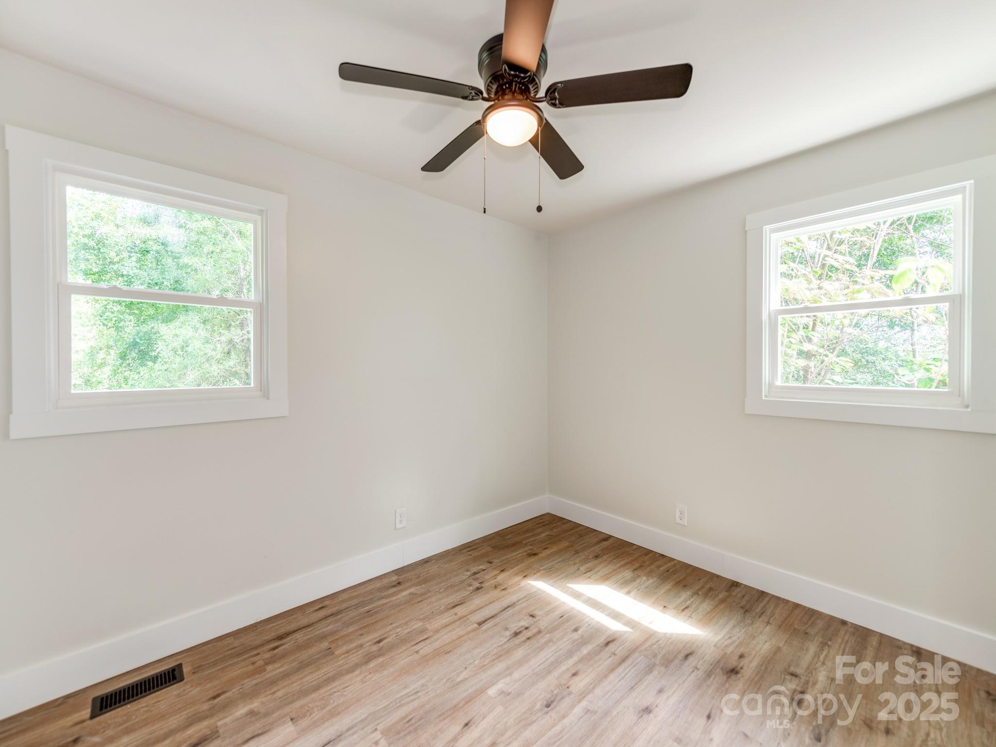 5404 Hope Road Vale, NC 28168 - Photo 15 of 28 wooden floor in an empty room with a window