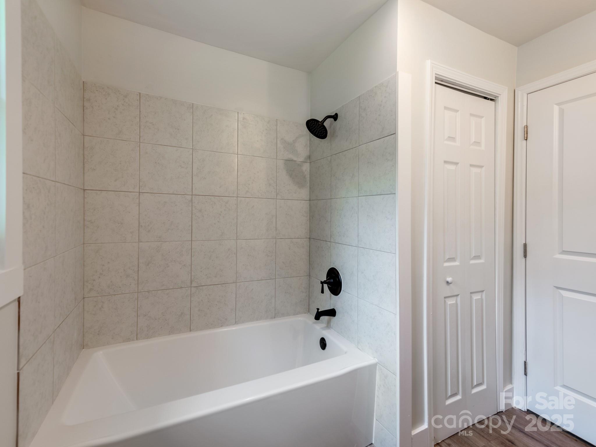 5404 Hope Road Vale, NC 28168 - Photo 18 of 28 a bathroom with a bathtub