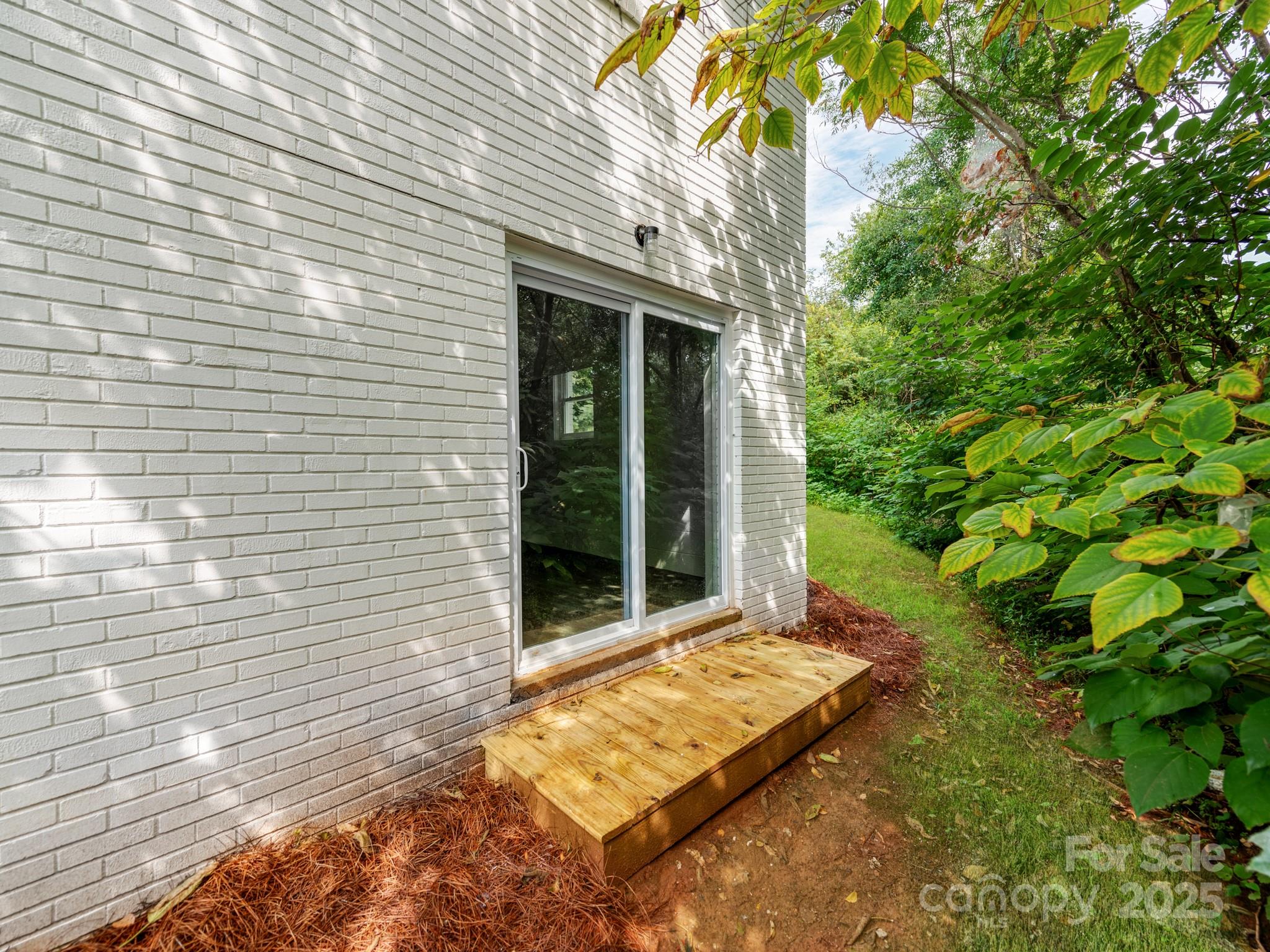 5404 Hope Road Vale, NC 28168 - Photo 26 of 28 a view of backyard with a small cabin
