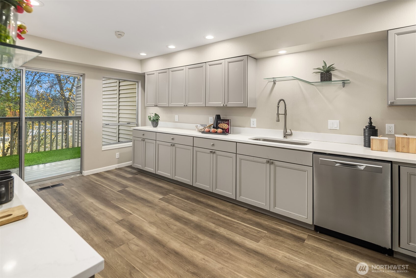 7250 Old Redmond Road, Unit C111 Redmond, WA 98052 - Photo 13 of 39 a spacious bathroom with a double vanity sink a mirror and next to a window