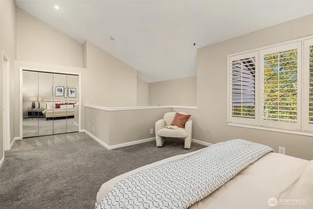 a bedroom with a bed and a cabinets