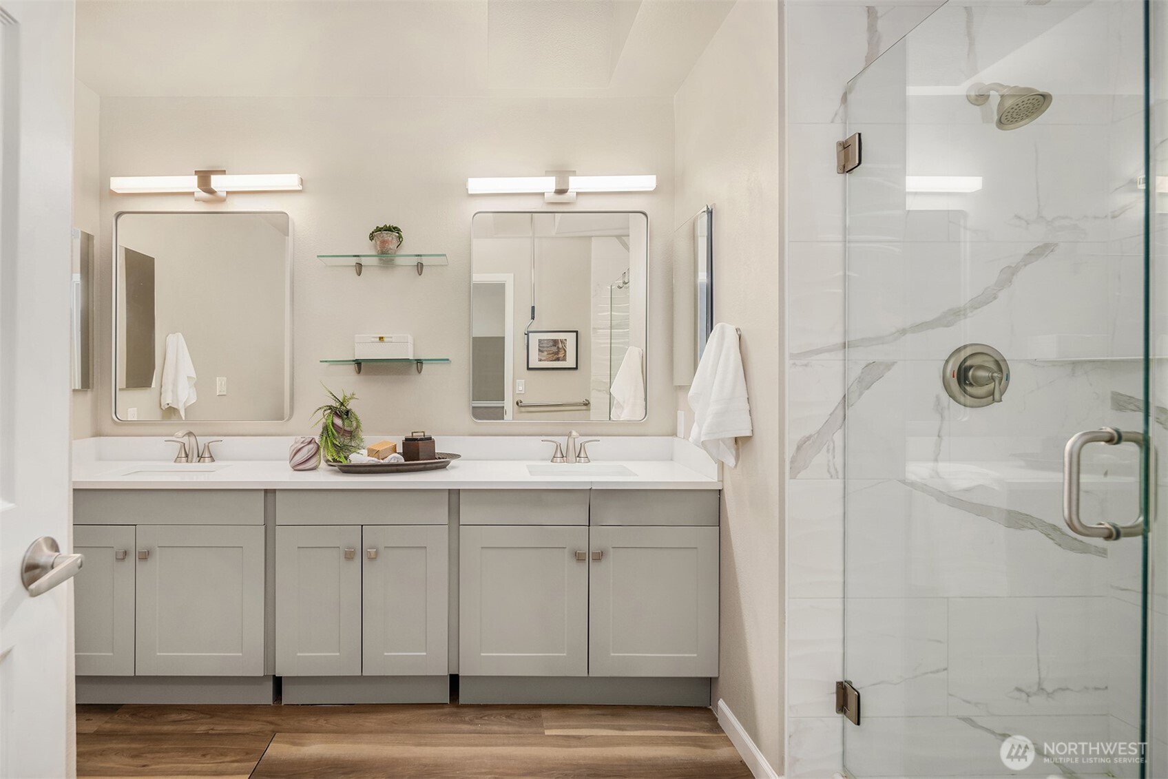 7250 Old Redmond Road, Unit C111 Redmond, WA 98052 - Photo 20 of 39 a spacious bathroom with a shower sink and mirror