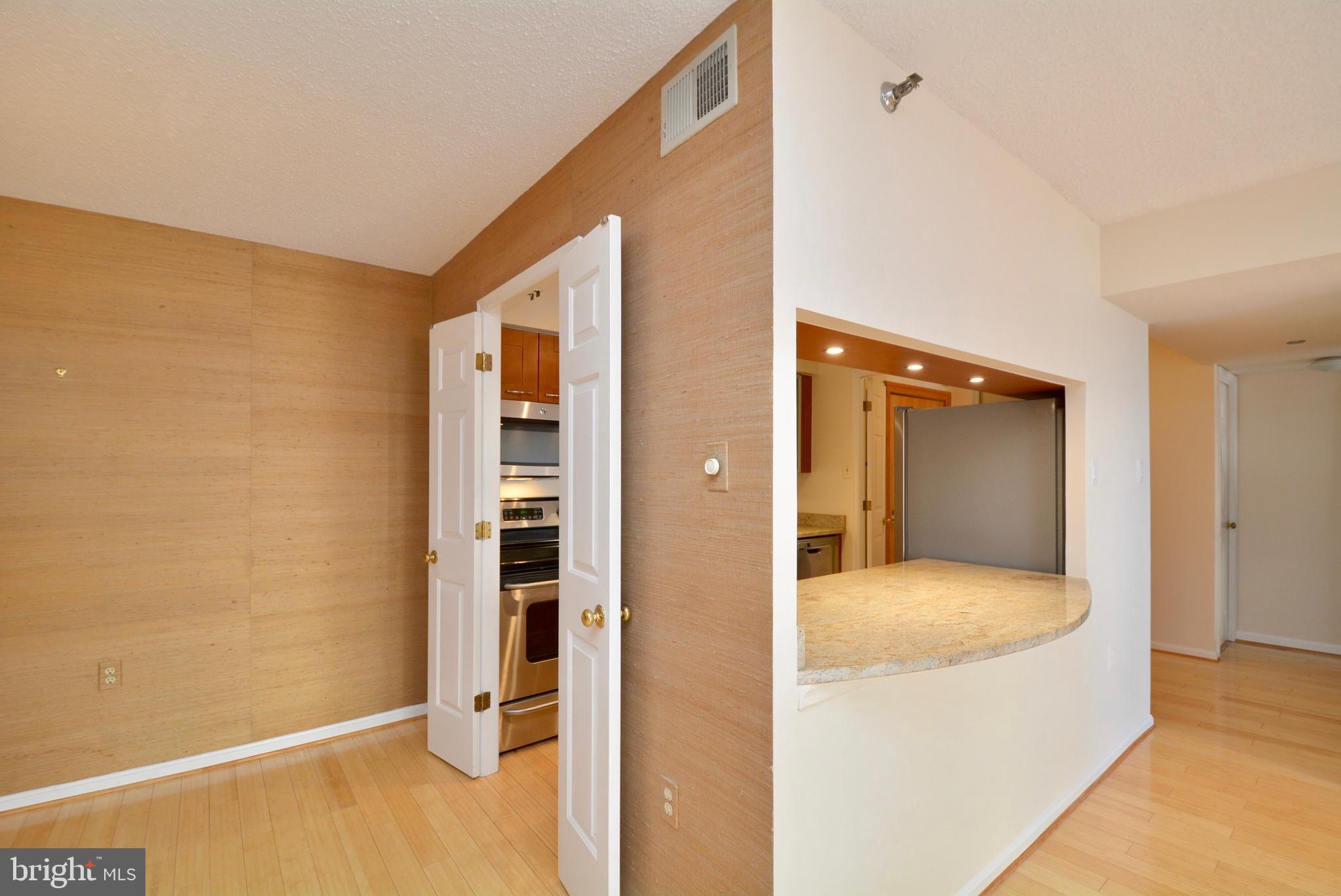 1301 North Courthouse Road, Unit 1512 Arlington, VA 22201 - Photo 17 of 37 Large pass throuh counter