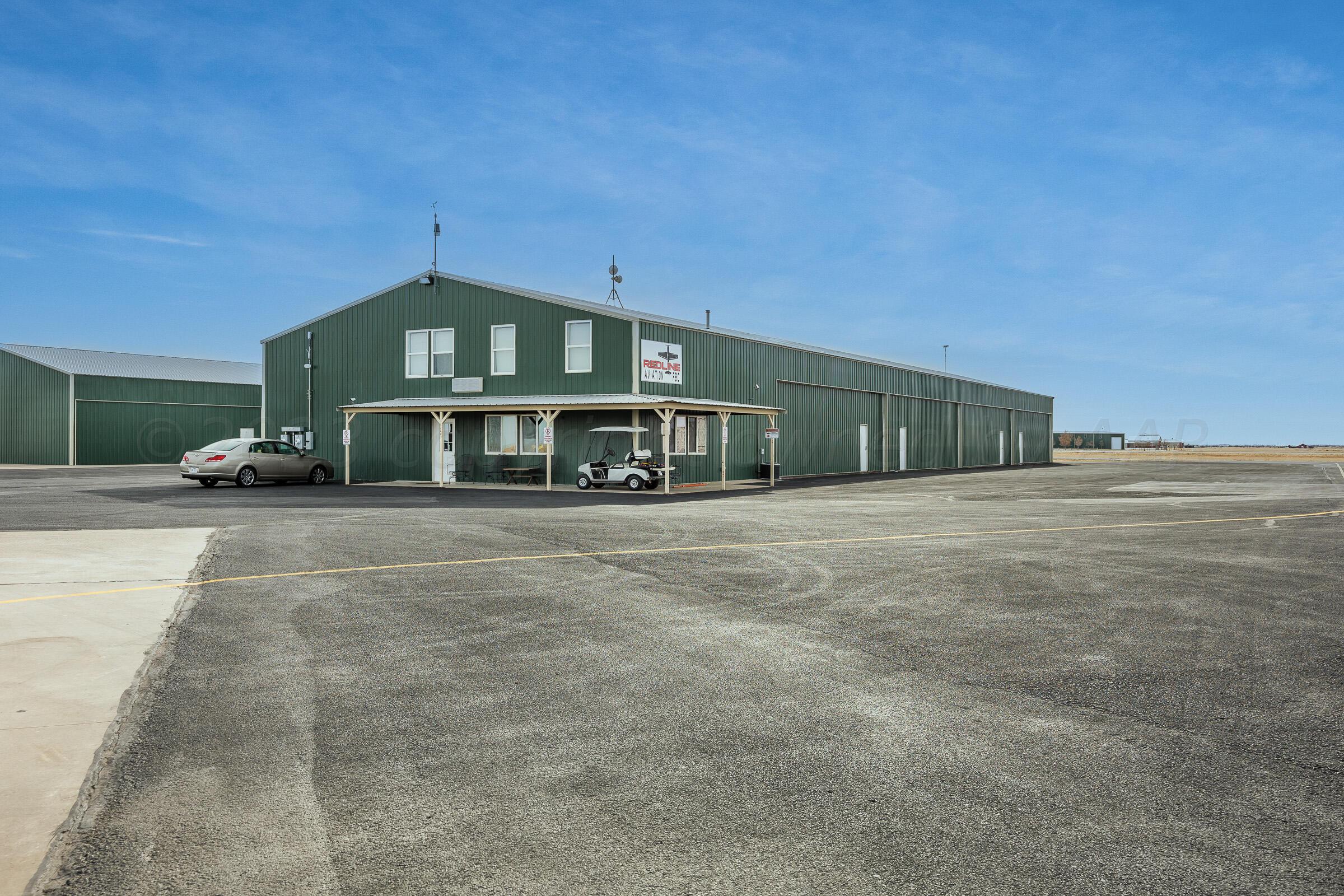 11961 Equestrian Trail Amarillo, TX 79118 - Photo 7 of 10 a front view of a house with a yard