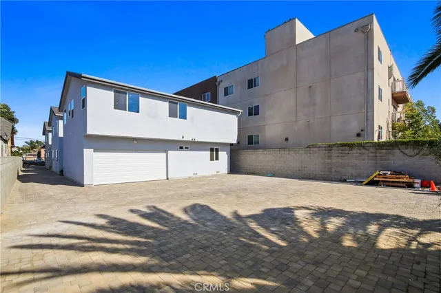 a front view of a house with a snow in front of it