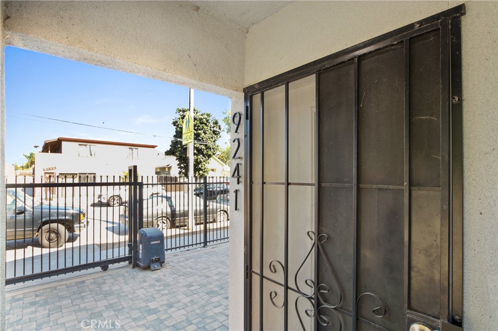 9241 1/2 Firth Boulevard, Unit 1/2 Los Angeles, CA 90002 - Photo 2 of 25 a view of a balcony