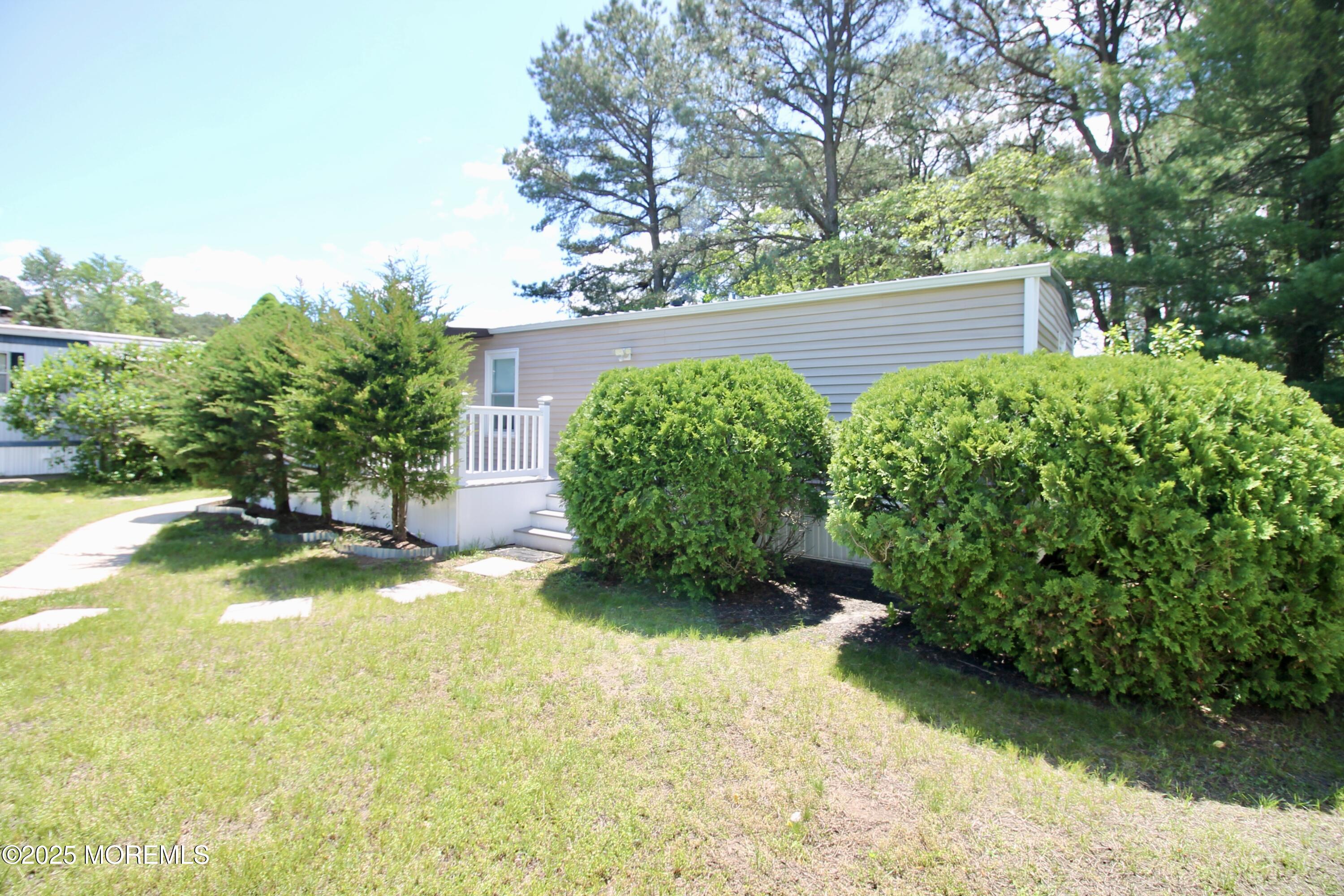 41 Eagle Drive Whiting, NJ 08759 - Photo 2 of 31 a view of swimming pool with garden