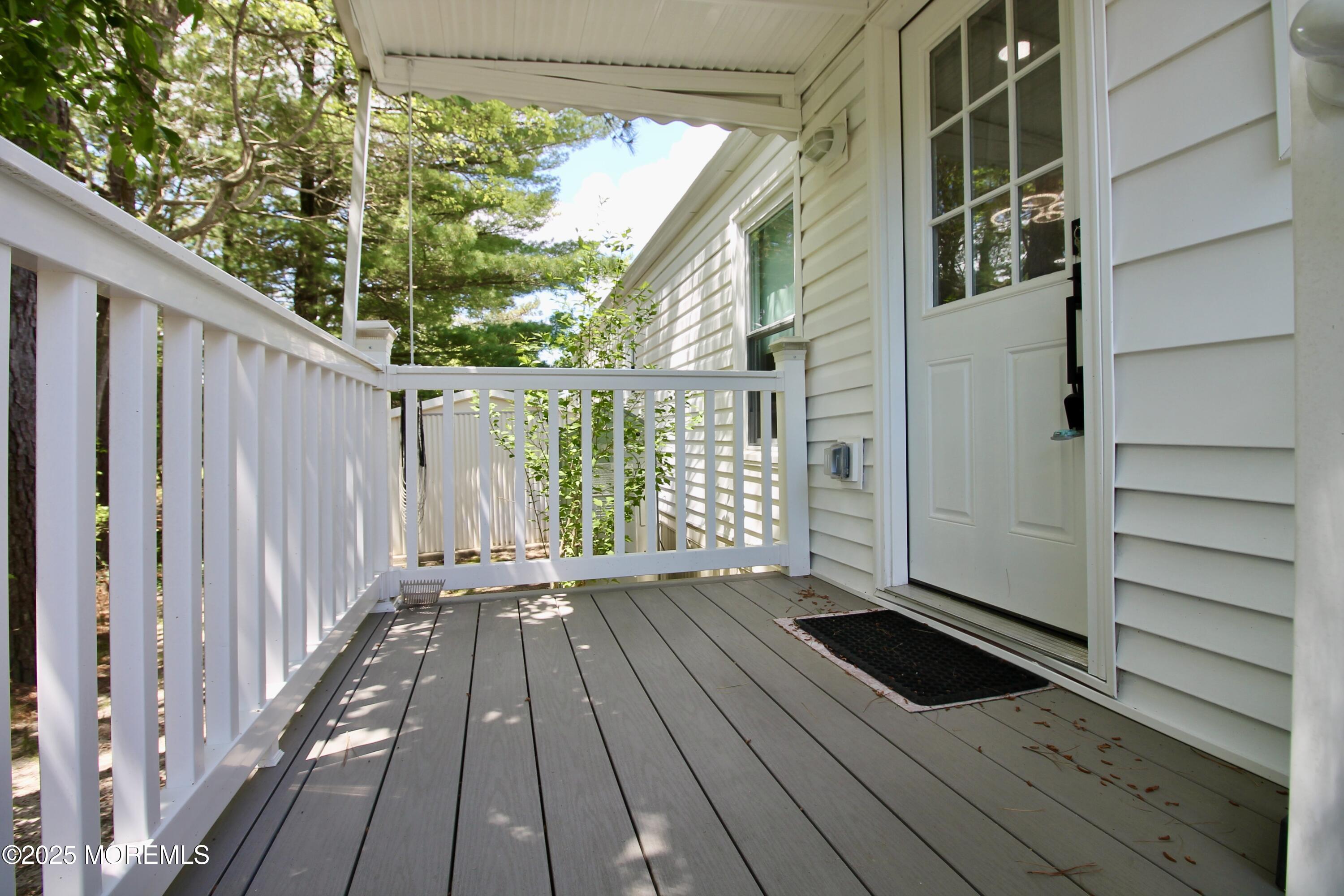 41 Eagle Drive Whiting, NJ 08759 - Photo 26 of 31 a view of balcony with wooden floor and fence