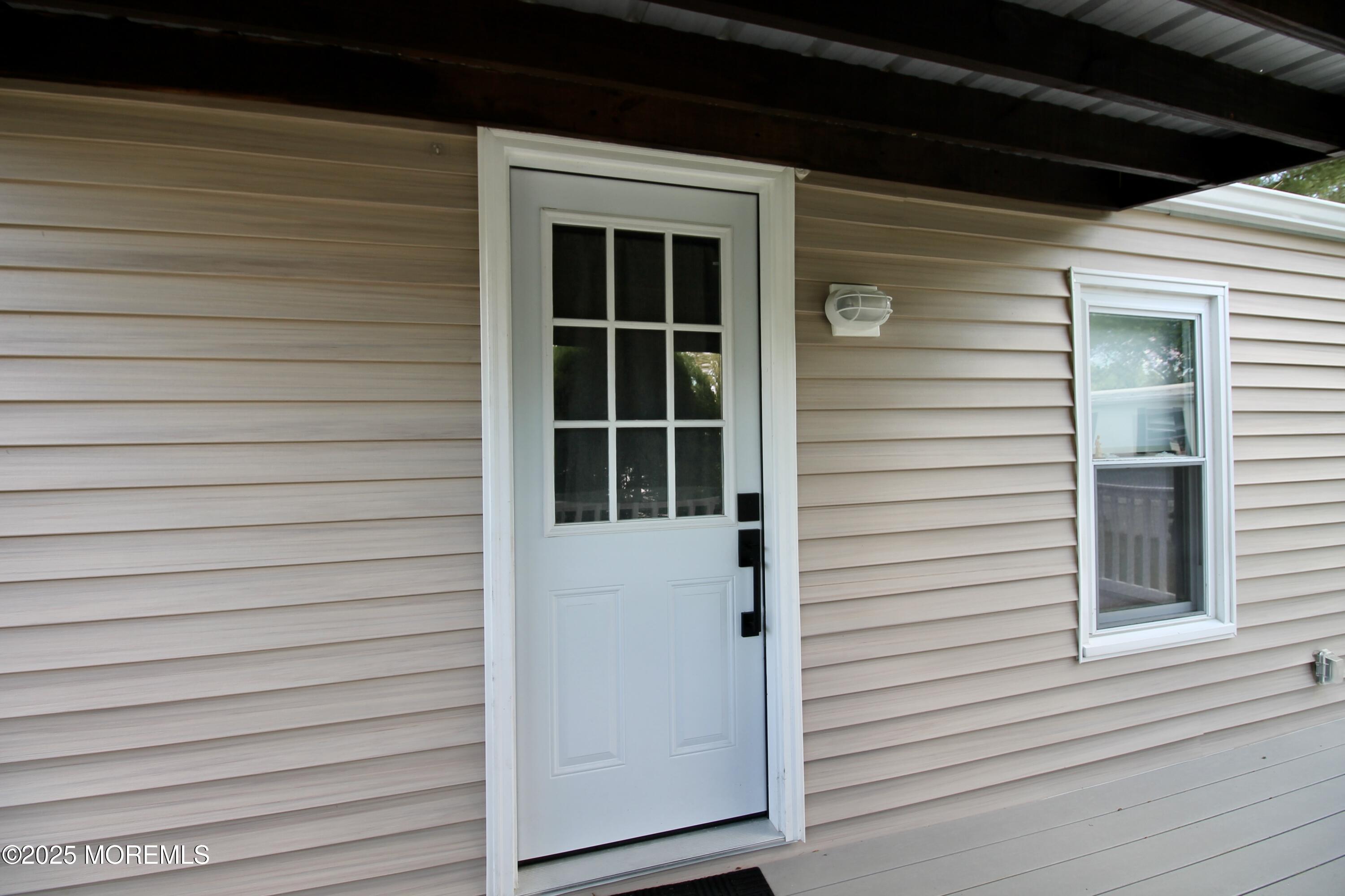 41 Eagle Drive Whiting, NJ 08759 - Photo 7 of 31 a view of front door and porch