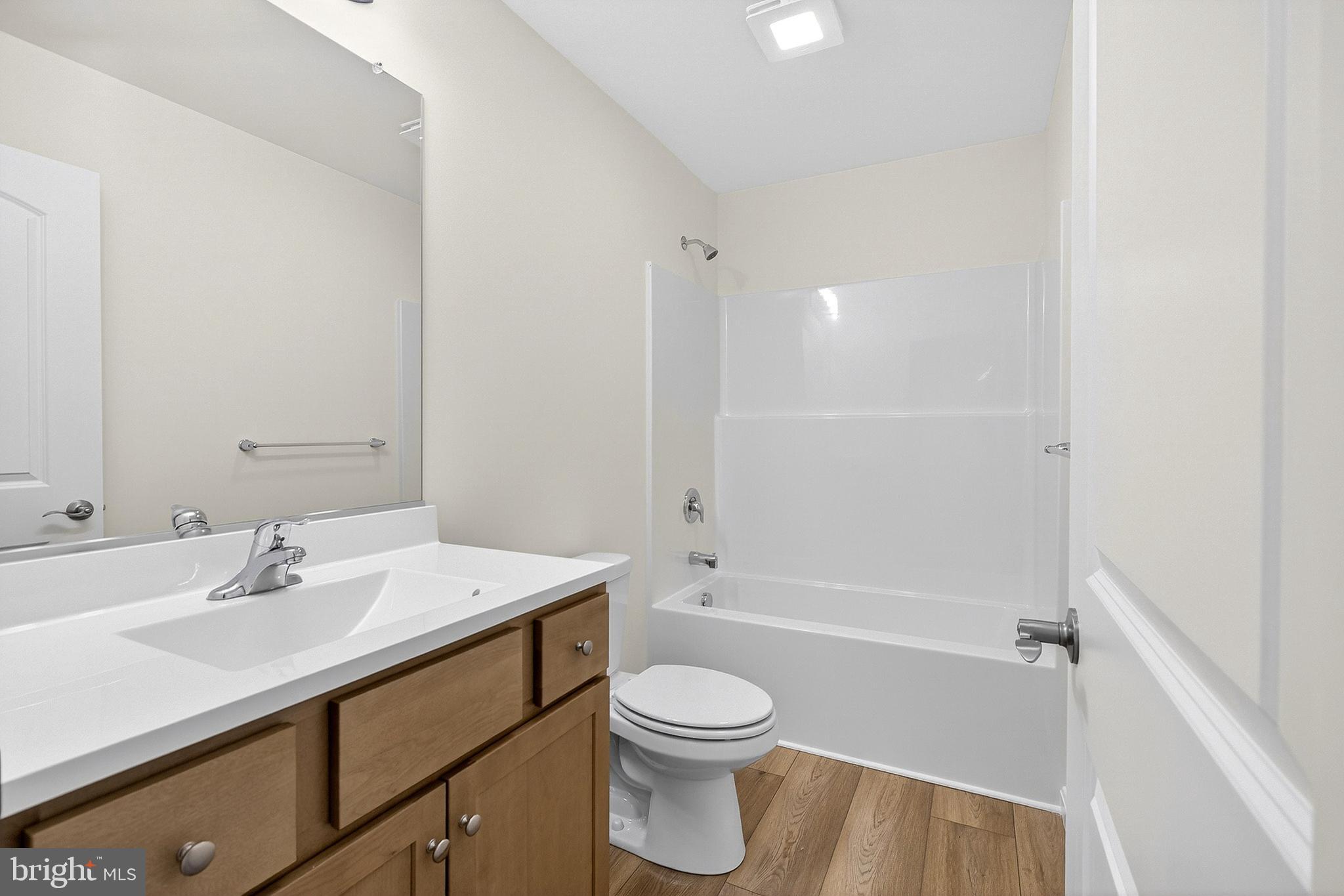 719 West Evens Road Viola, DE 19979 - Photo 28 of 65 a bathroom with a sink a toilet and shower