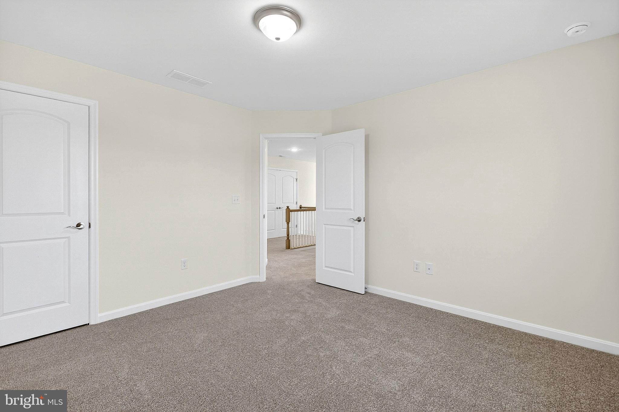 719 West Evens Road Viola, DE 19979 - Photo 30 of 65 a view of an empty room and a kitchen