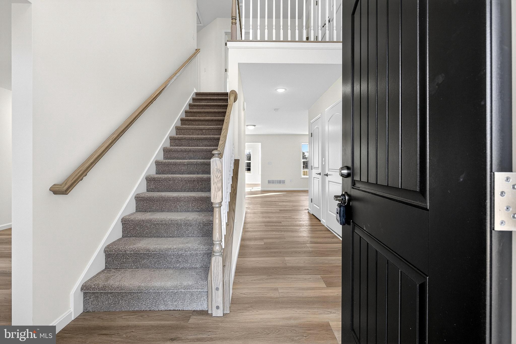 719 West Evens Road Viola, DE 19979 - Photo 4 of 65 a view of a hallway with stairs