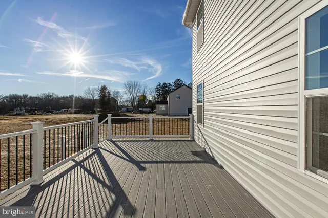 a aerial view of a house with a yard