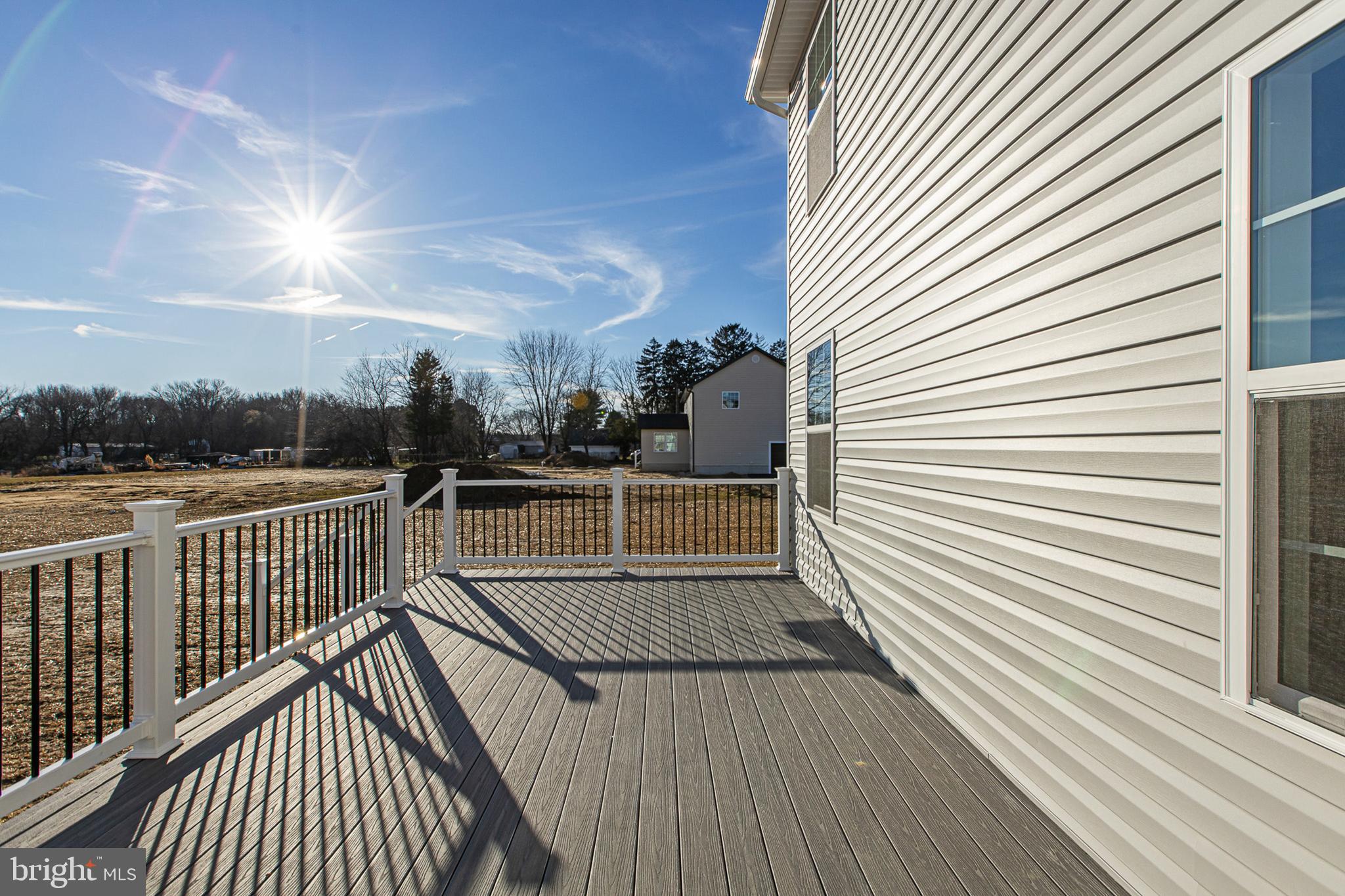 719 West Evens Road Viola, DE 19979 - Photo 49 of 65 a view of a balcony with wooden floor