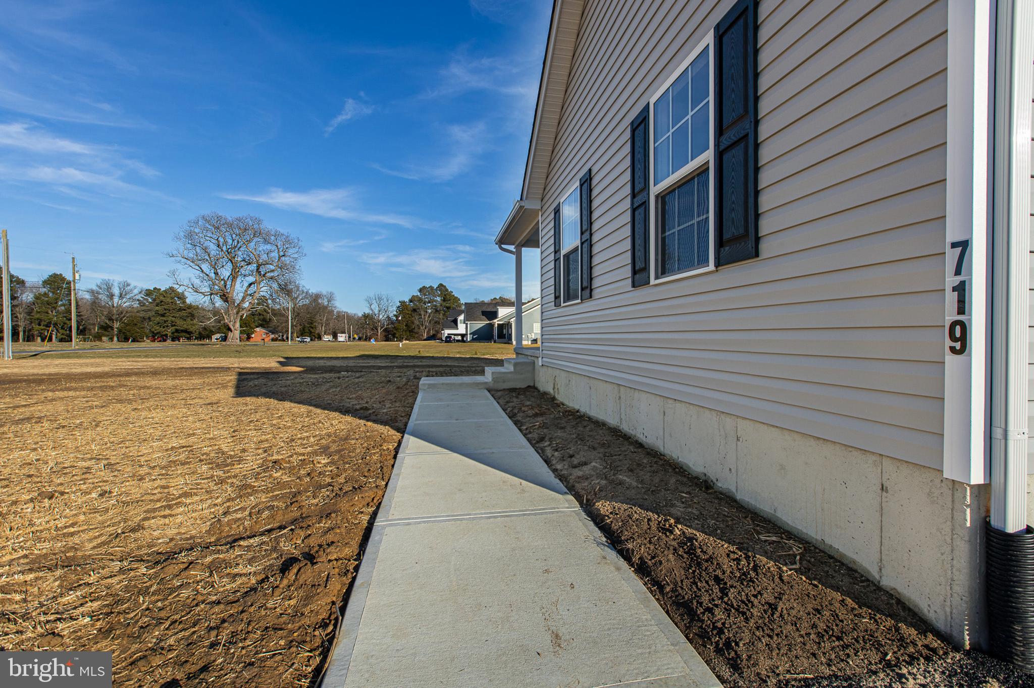 719 West Evens Road Viola, DE 19979 - Photo 51 of 65 a view of a pathway with a yard