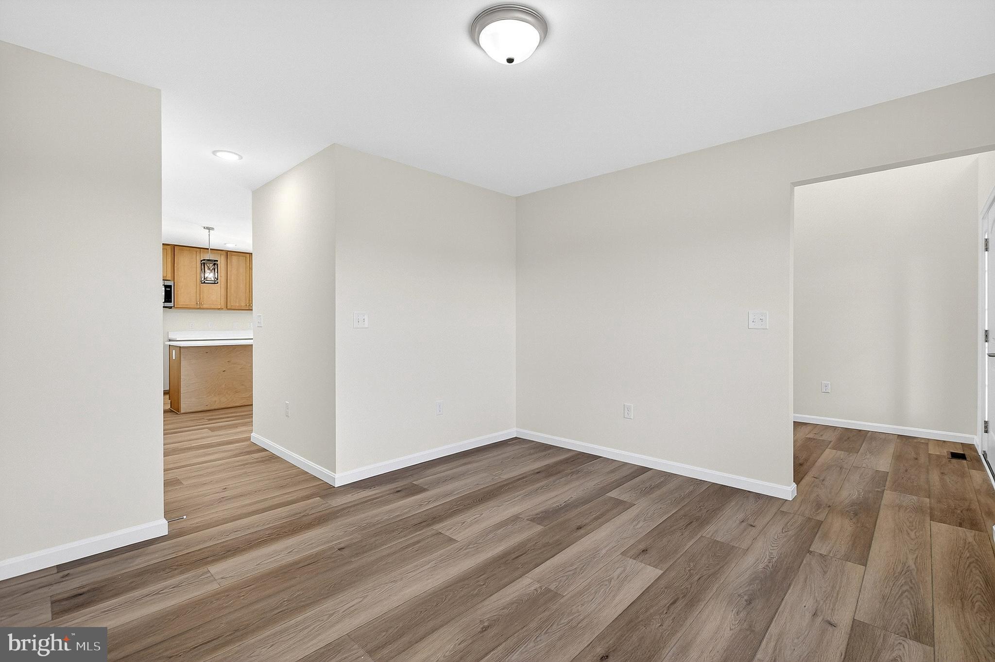 719 West Evens Road Viola, DE 19979 - Photo 6 of 65 a view of a room with wooden floor