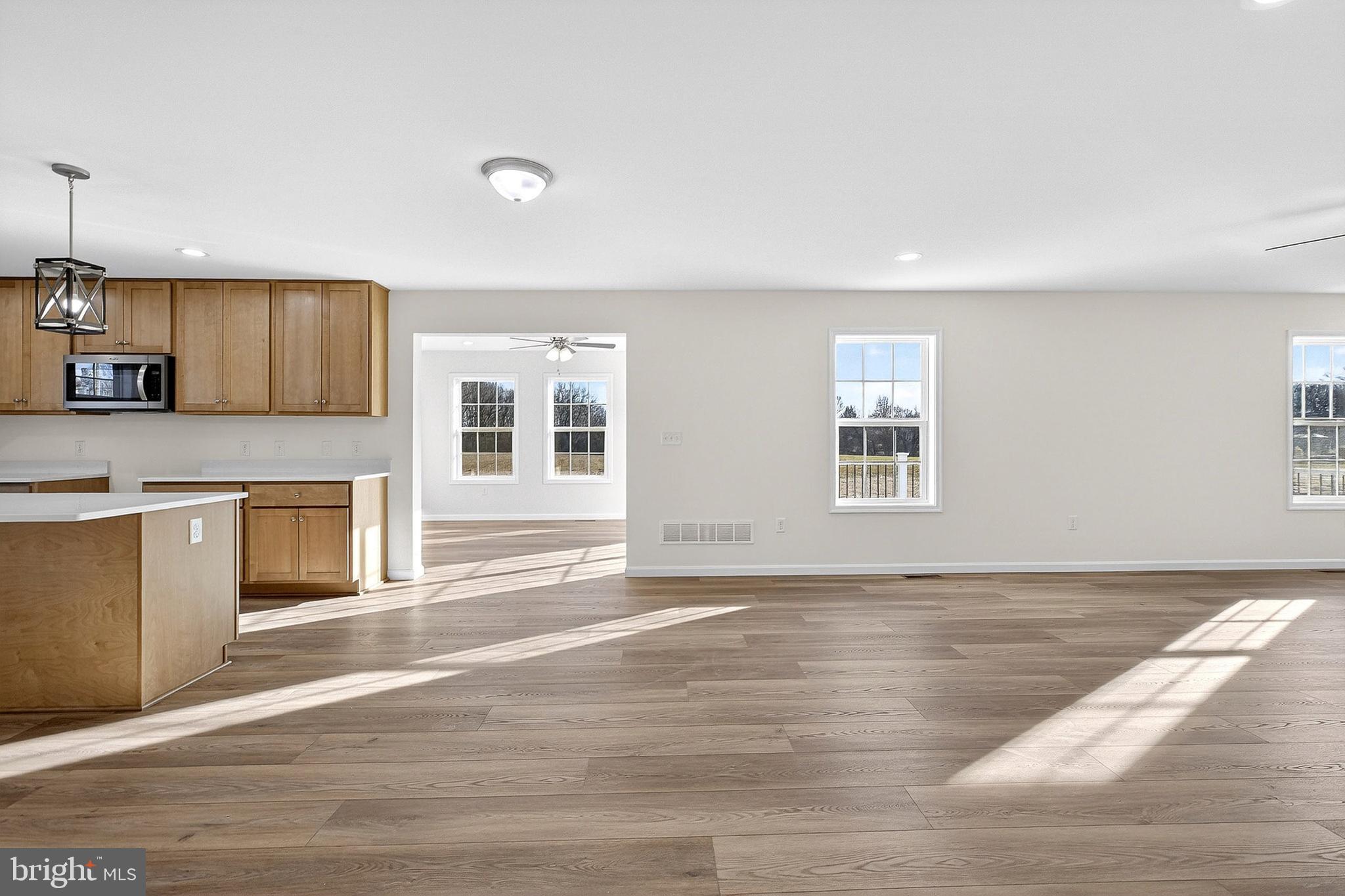 719 West Evens Road Viola, DE 19979 - Photo 10 of 65 a view of a kitchen with an empty space and a window