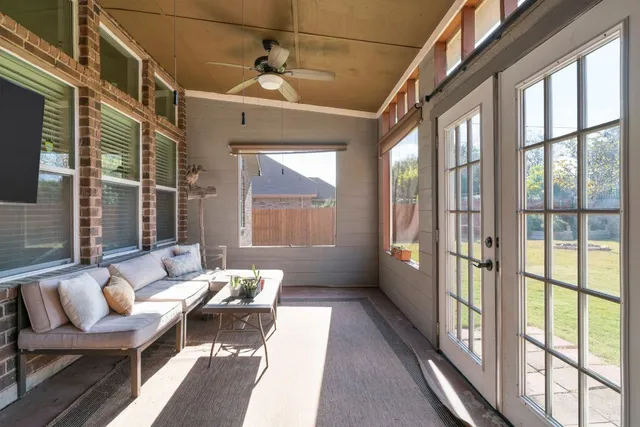 a backyard of a house with a swing