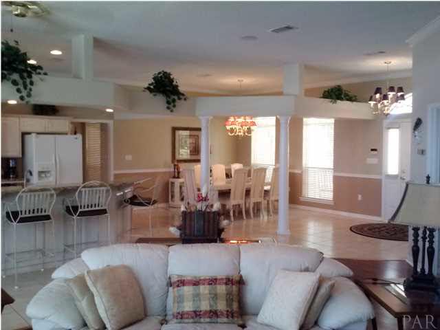 1498 Chemstrand Road Cantonment, FL 32533 - Photo 23 of 23 SPACIOUS , OPEN FLOOR PLAN FROM FAMILY ROOM LOOKING BACK TOWARD FORMAL DINING ROOM
