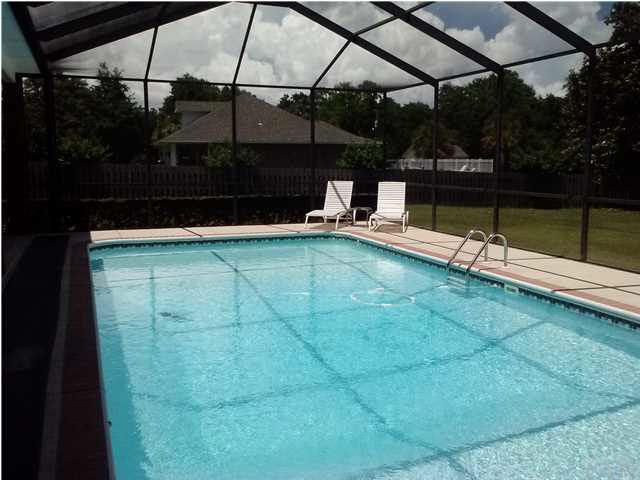 1498 Chemstrand Road Cantonment, FL 32533 - Photo 7 of 23 18X36 SCREENED ENCLOSED POOL GREAT FOR FAMILY AND SPECIAL ENTERTAINING