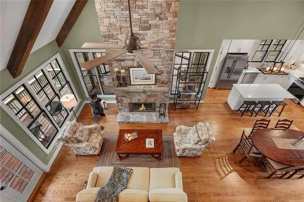 a kitchen with stainless steel appliances granite countertop a stove and a refrigerator
