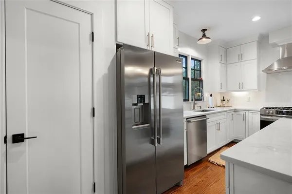a view of a glass door with a balcony