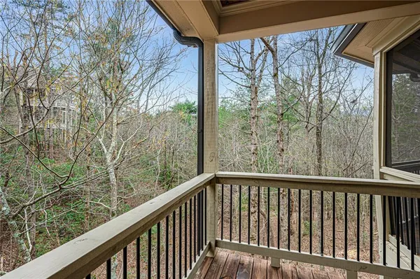 a view of entryway with wooden floor and stairs
