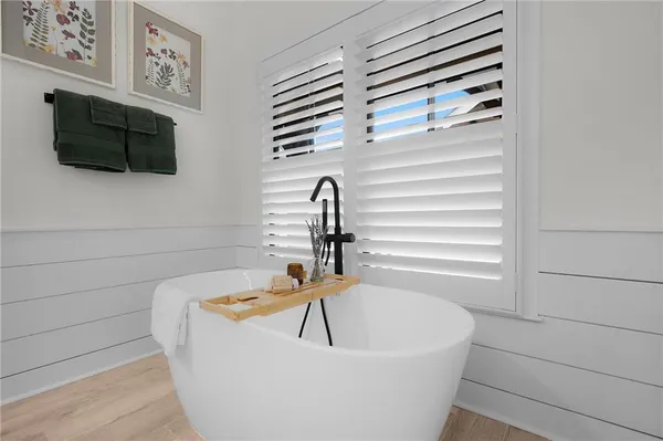 a view of an empty room with glass door