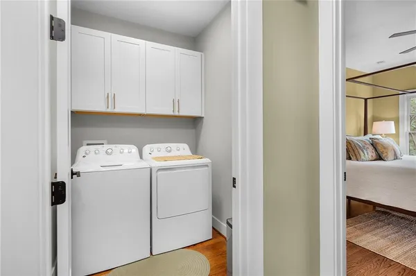 an empty room with a ceiling fan