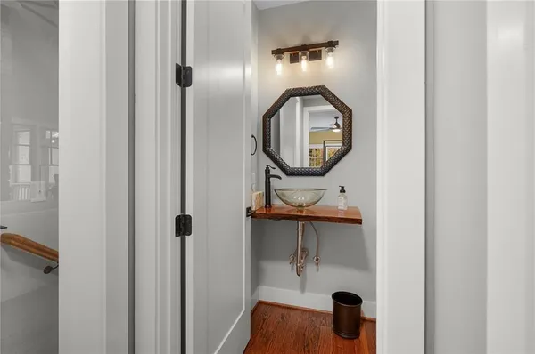 a view of a room with wooden walls