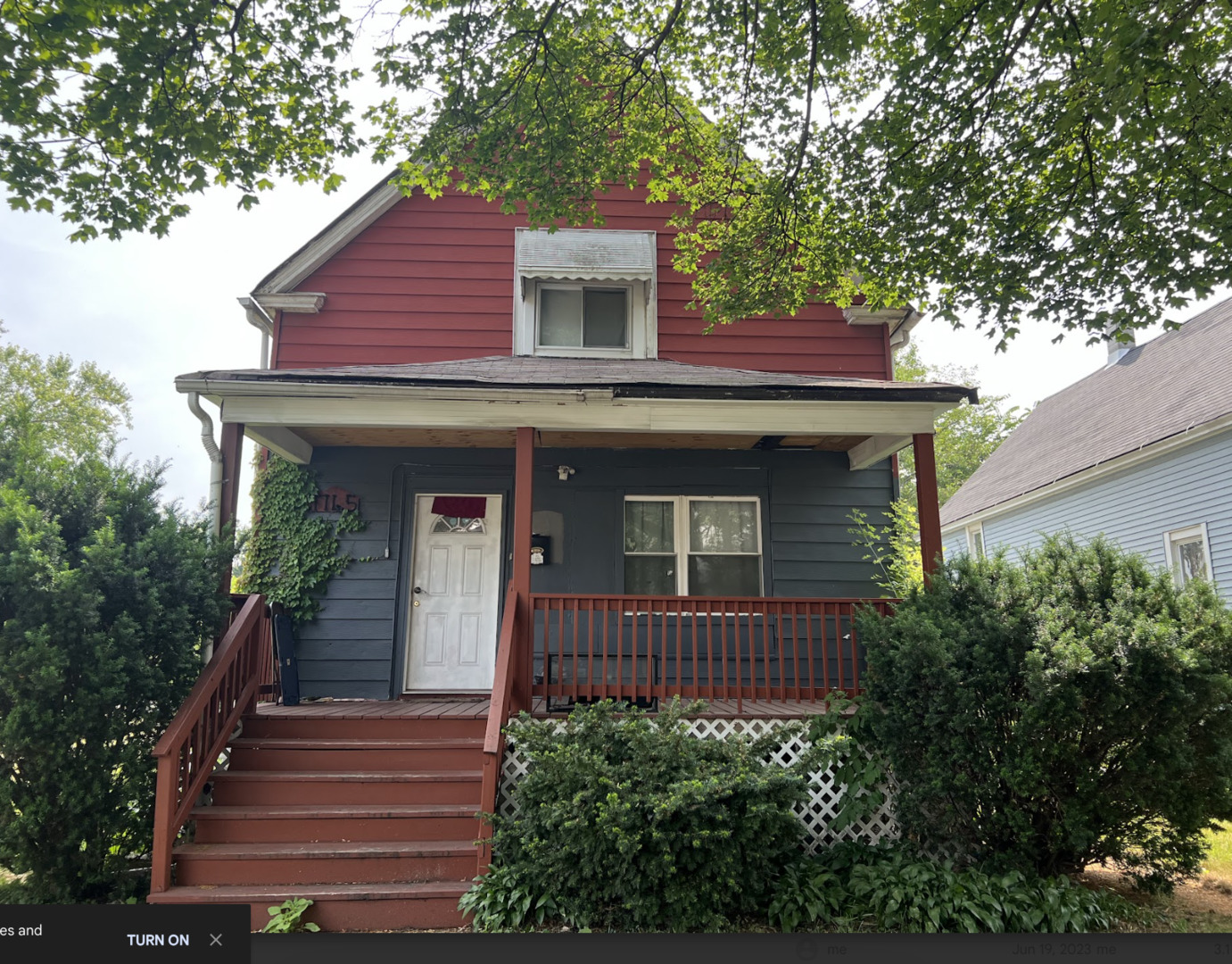 11745 South Wallace Street Chicago, IL 60628 - Photo 1 of 13 a front view of a house with a yard