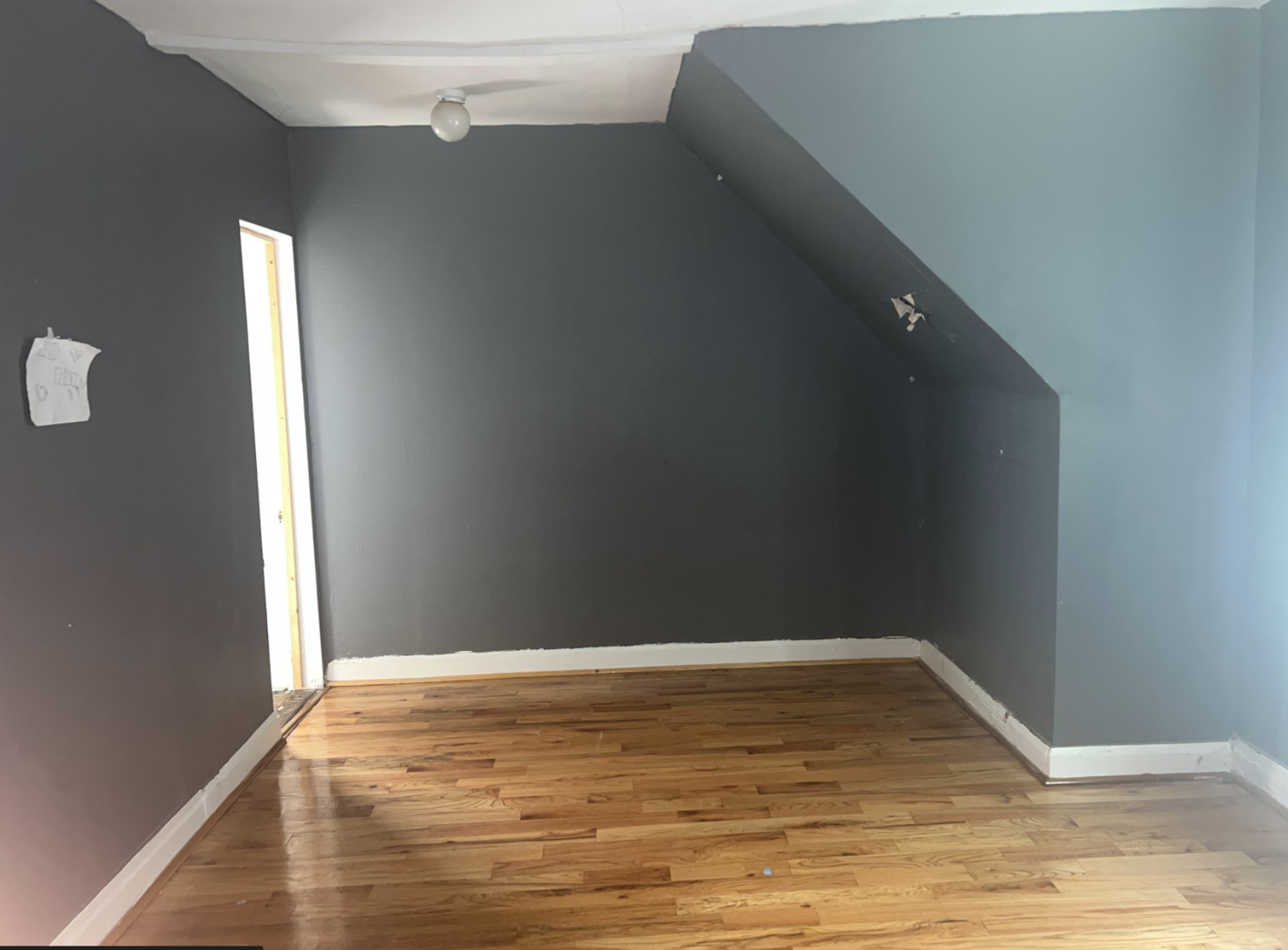 11745 South Wallace Street Chicago, IL 60628 - Photo 8 of 13 a view of empty room with wooden floor