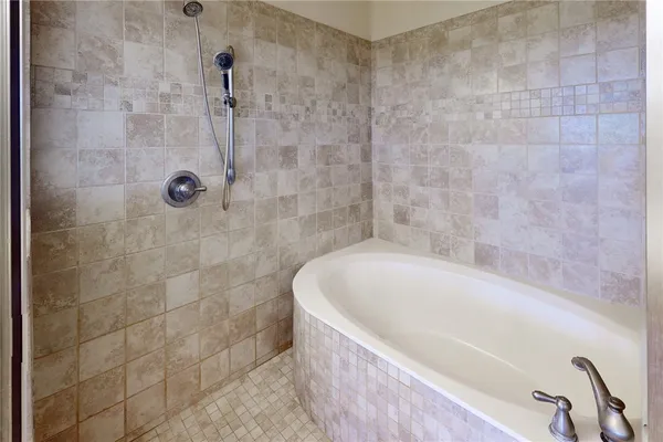 a bathroom with a bathtub