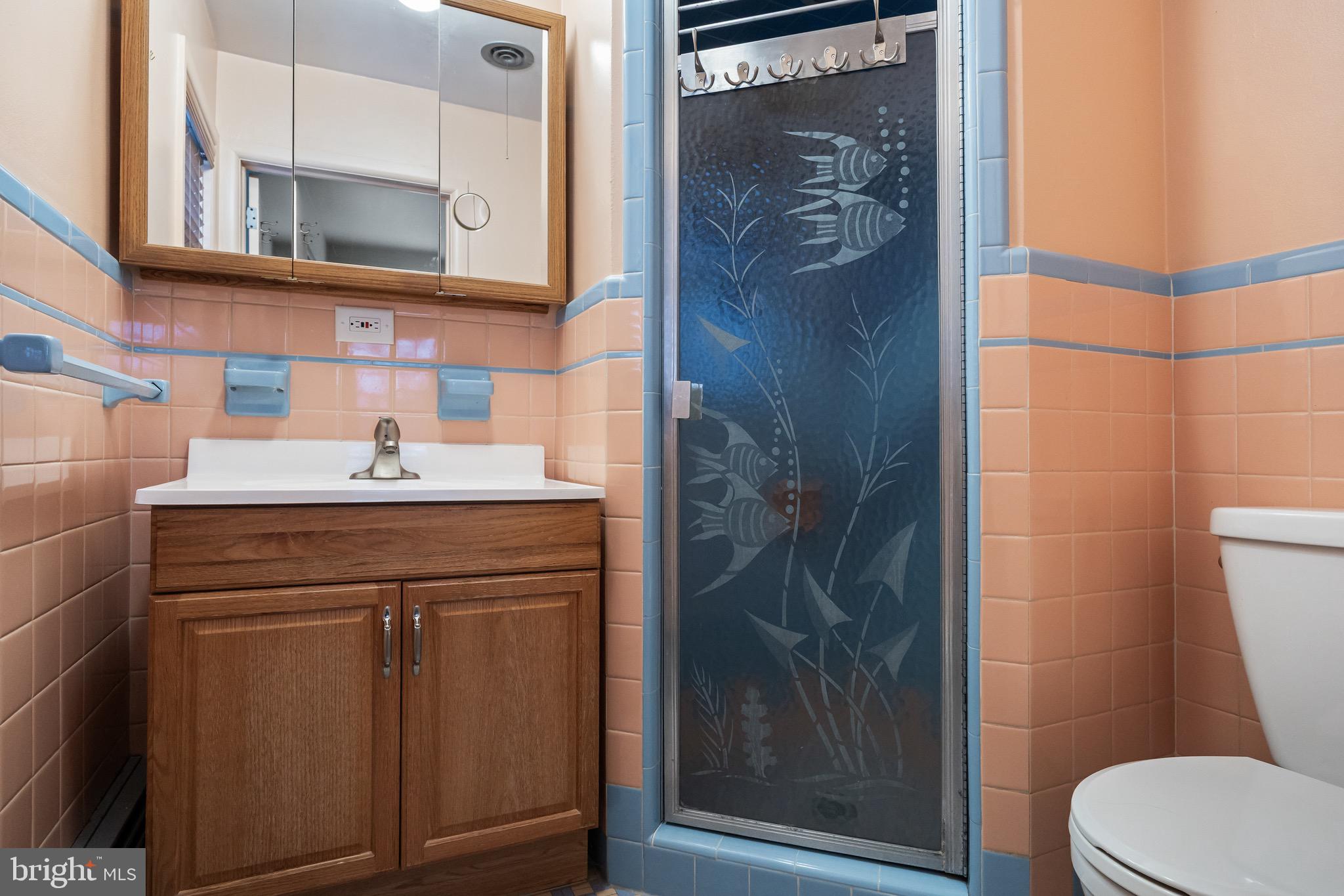 55 East Evesham Road Runnemede, NJ 08078 - Photo 14 of 26 a bathroom with a sink a toilet and shower