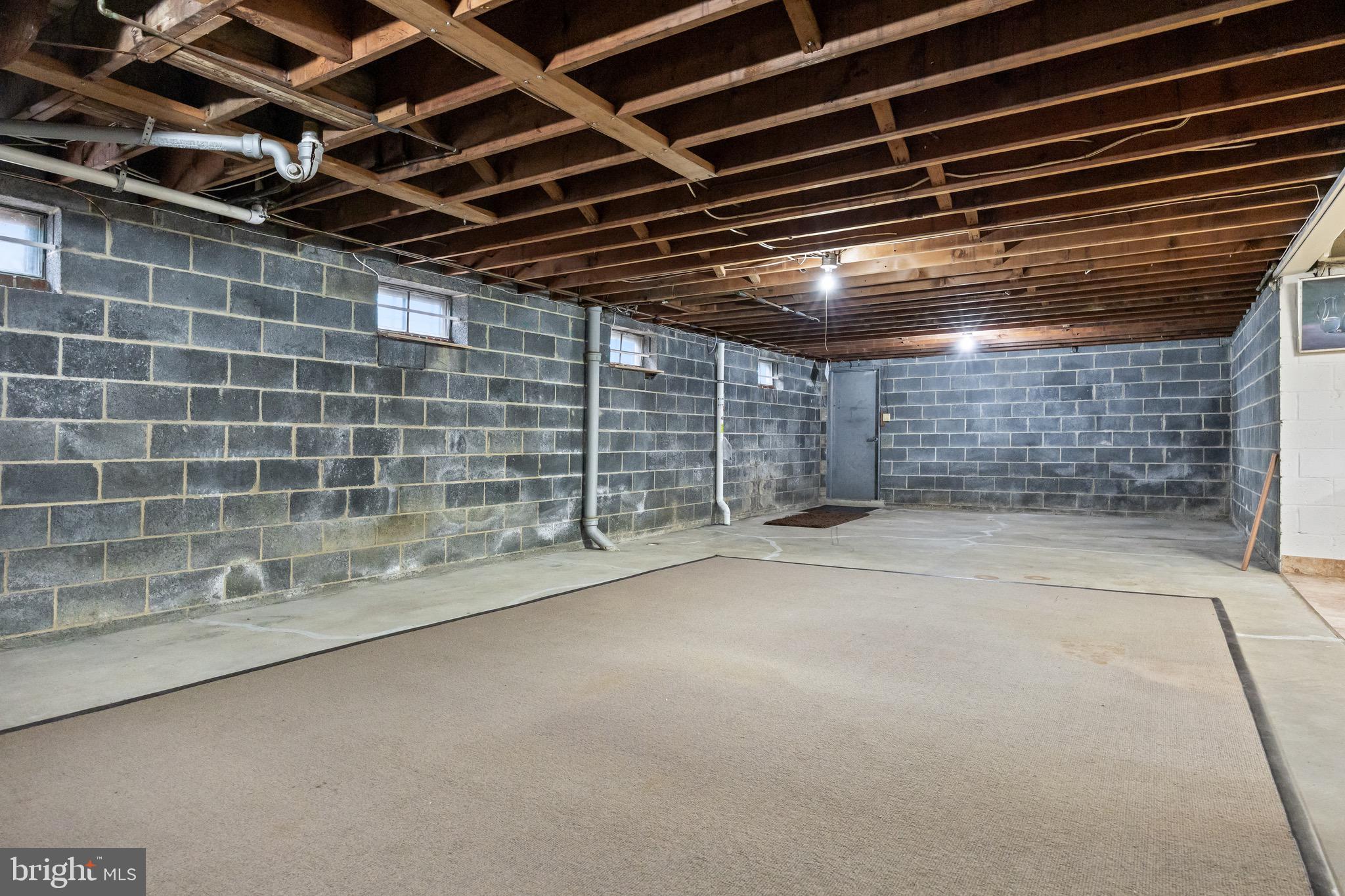 55 East Evesham Road Runnemede, NJ 08078 - Photo 18 of 26 a view of an empty room with wooden walls