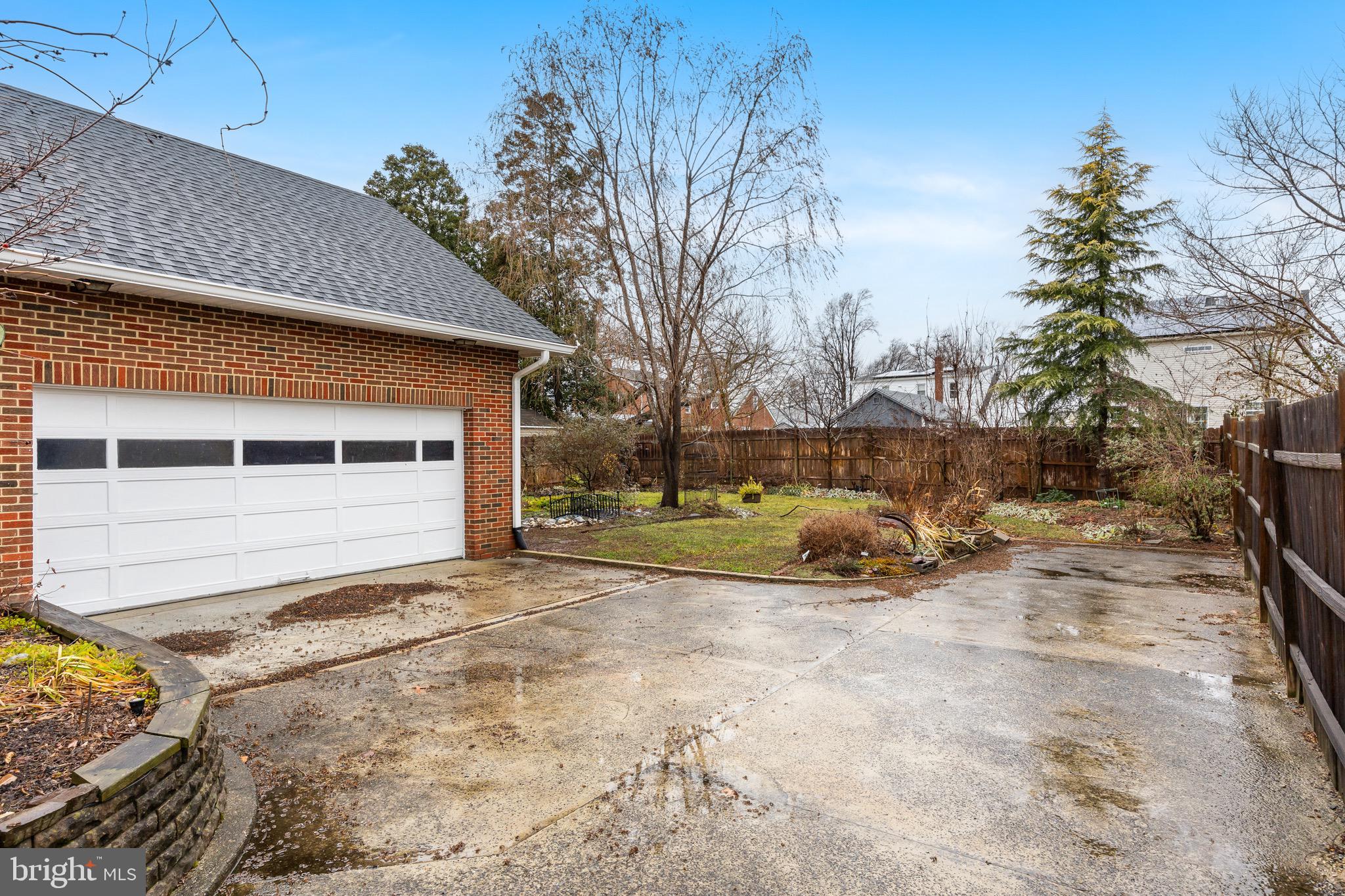 55 East Evesham Road Runnemede, NJ 08078 - Photo 23 of 26 a view of a house with a snow in the yard
