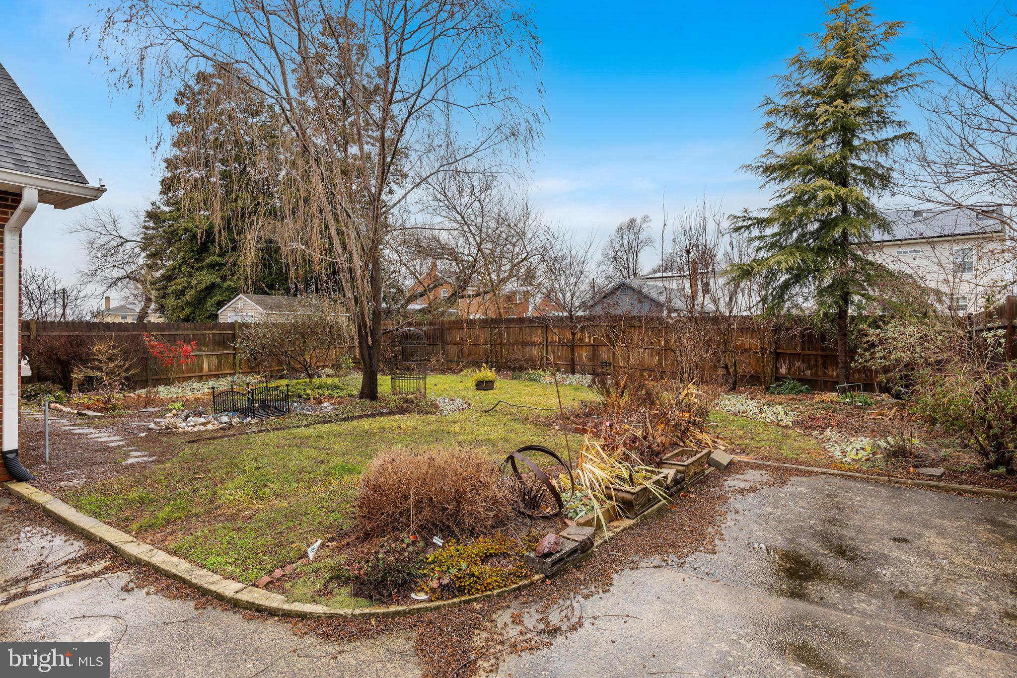 55 East Evesham Road Runnemede, NJ 08078 - Photo 24 of 26 a view of a backyard with wooden fence