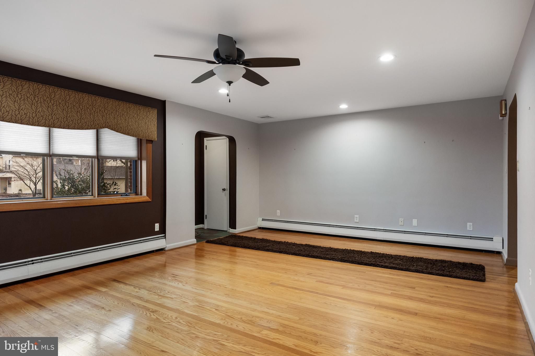 55 East Evesham Road Runnemede, NJ 08078 - Photo 6 of 26 a view of room with window and ceiling fan