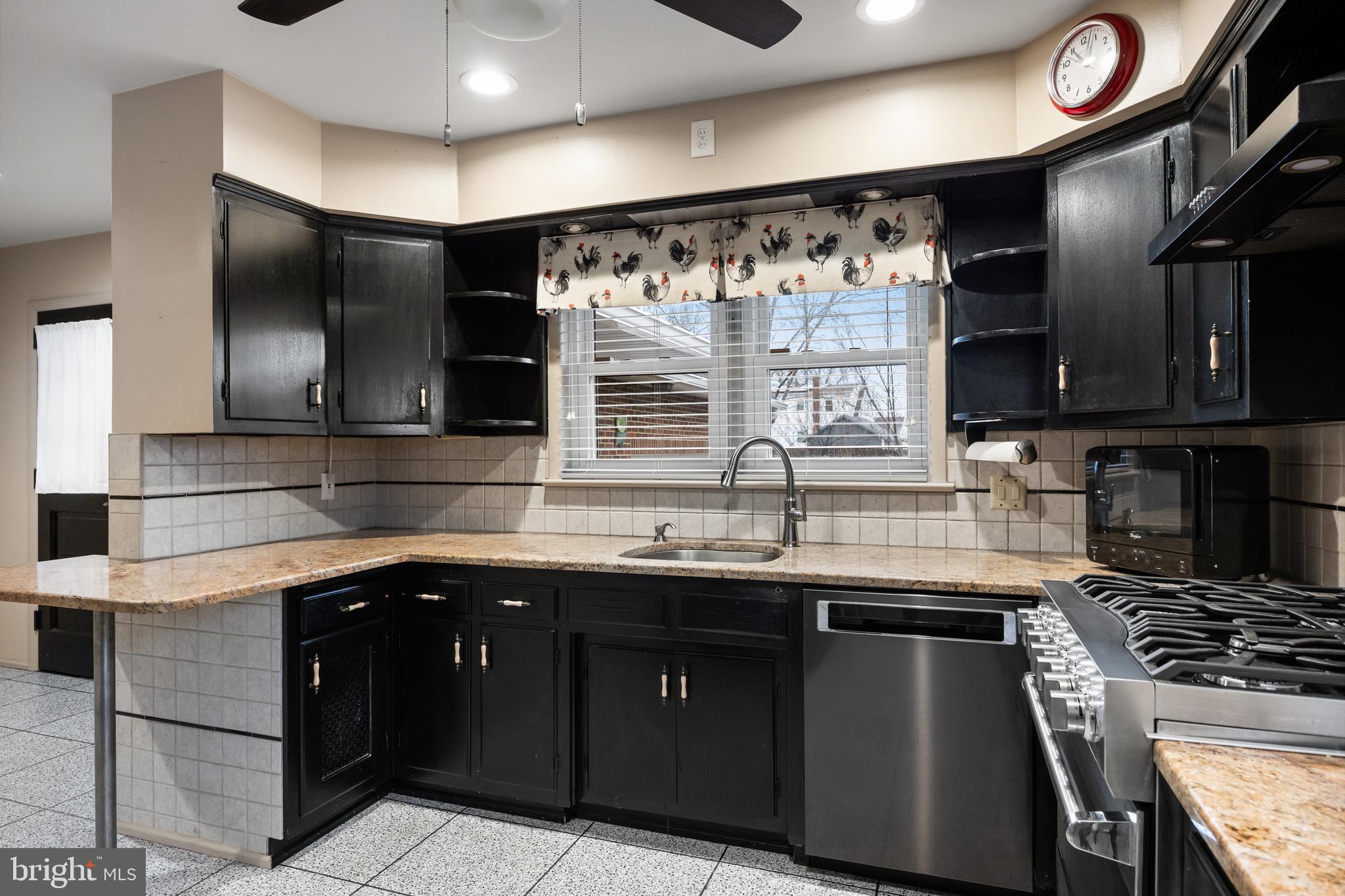 55 East Evesham Road Runnemede, NJ 08078 - Photo 10 of 26 a kitchen with a sink and cabinets