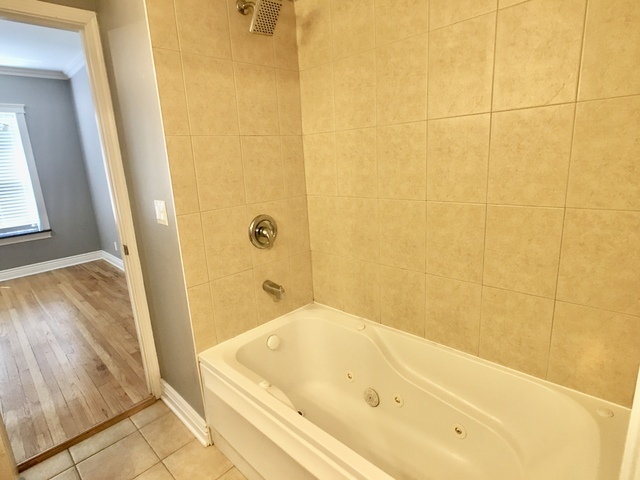 5934 North Paulina Street, Unit 2 Chicago, IL 60660 - Photo 12 of 12 a bathroom with a bathtub