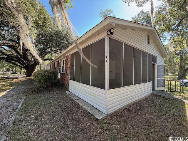 1909 9th Avenue Conway, SC 29527 - Photo 13 of 15 View of side of home with a sunroom