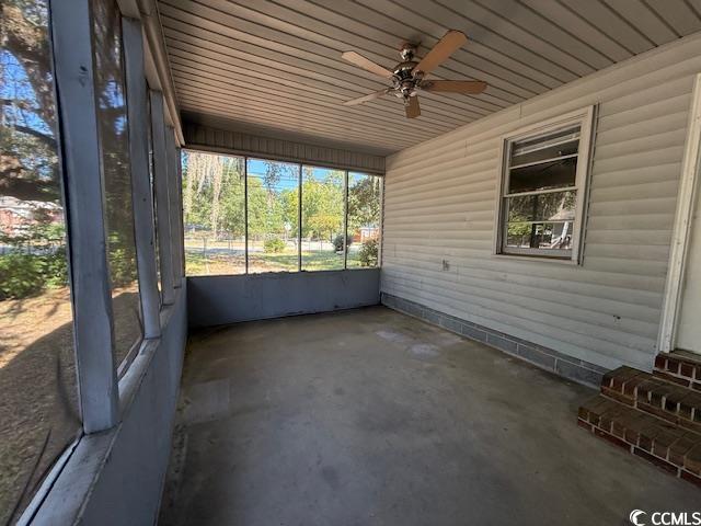 1909 9th Avenue Conway, SC 29527 - Photo 10 of 15 Unfurnished sunroom featuring a ceiling fan