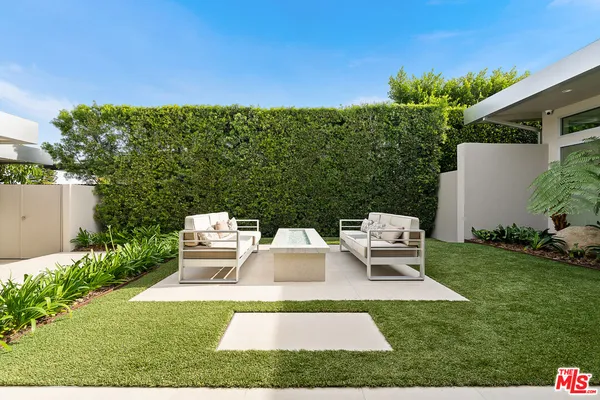 a swimming pool with a yard